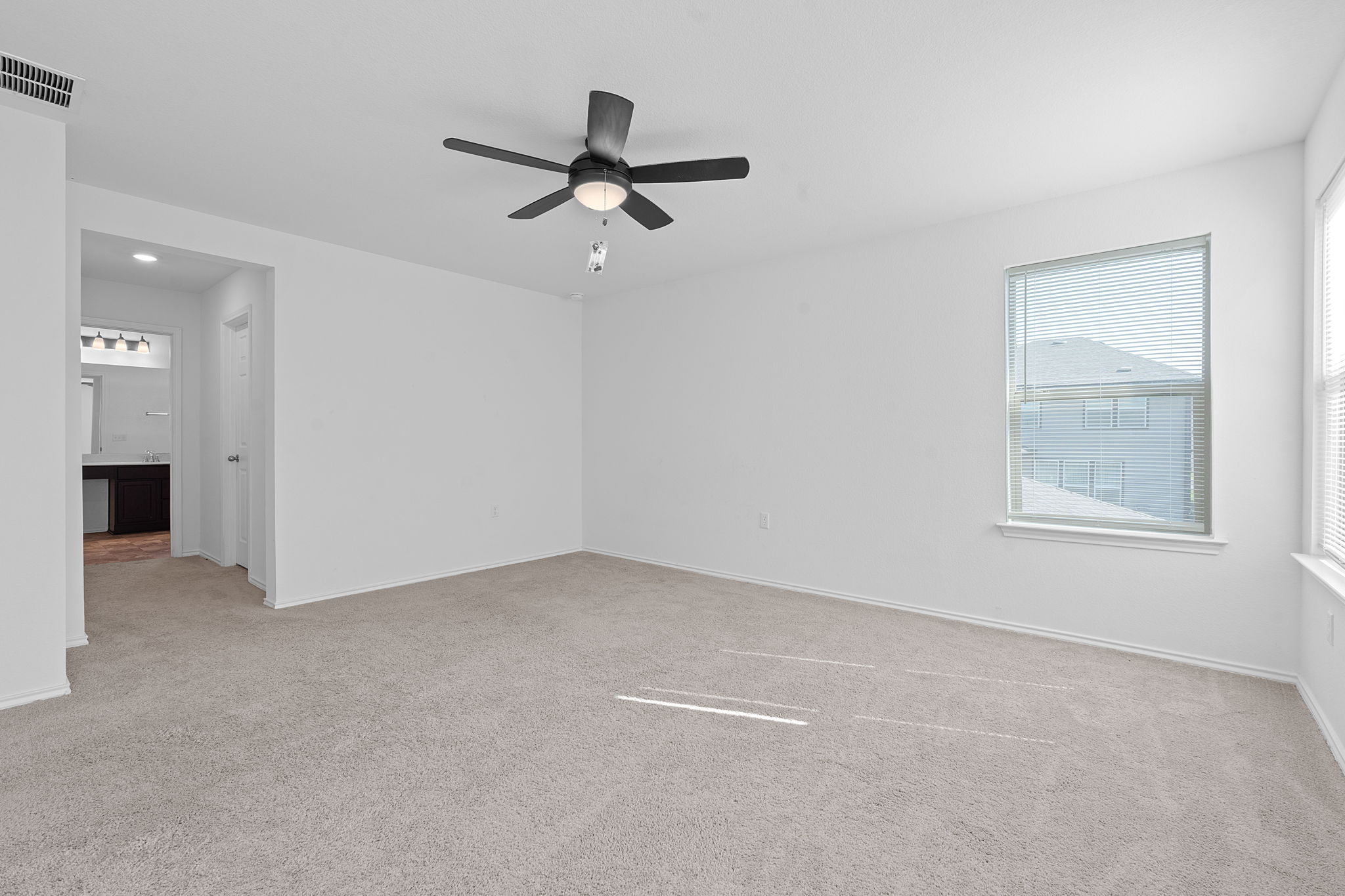 4720 Pell Rd Manor Manor, TX 78653 - Photo 14 of 31 a view of a livingroom with a ceiling fan and window