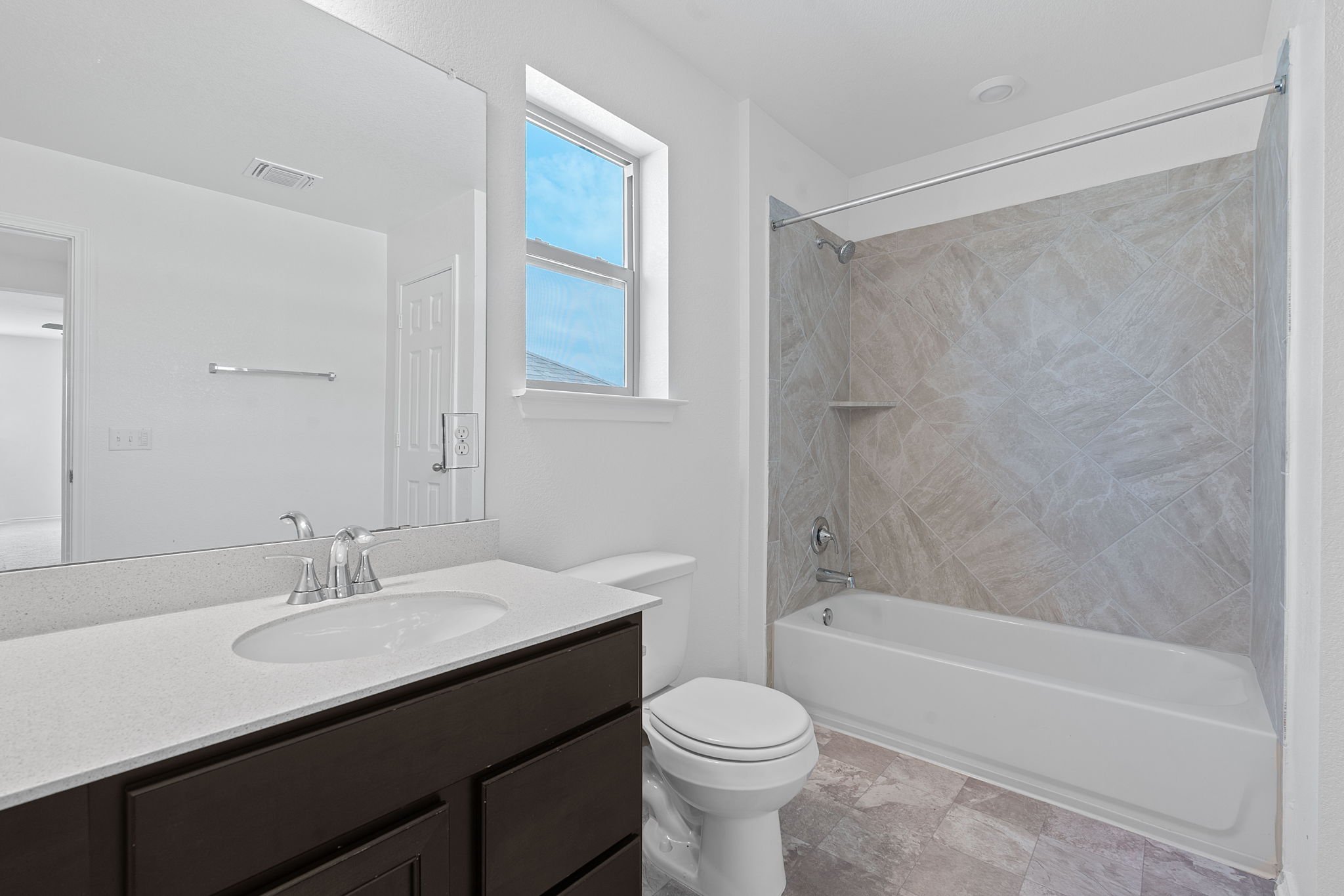 4720 Pell Rd Manor Manor, TX 78653 - Photo 17 of 31 a bathroom with a sink a toilet and a bathtub