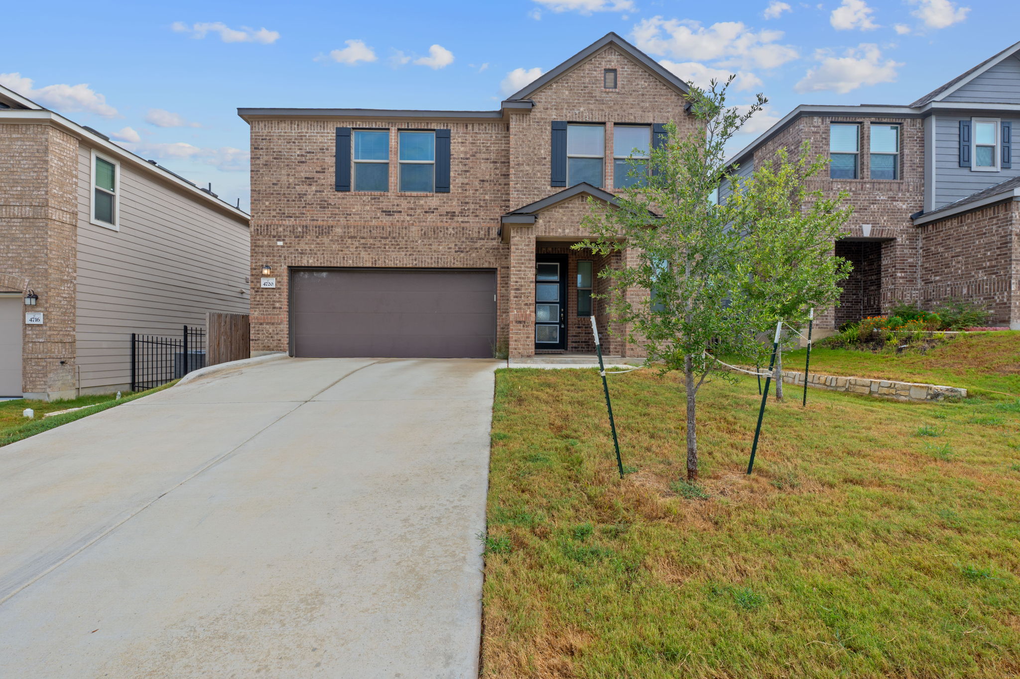 4720 Pell Rd Manor Manor, TX 78653 - Photo 2 of 31 a front view of a house with garden