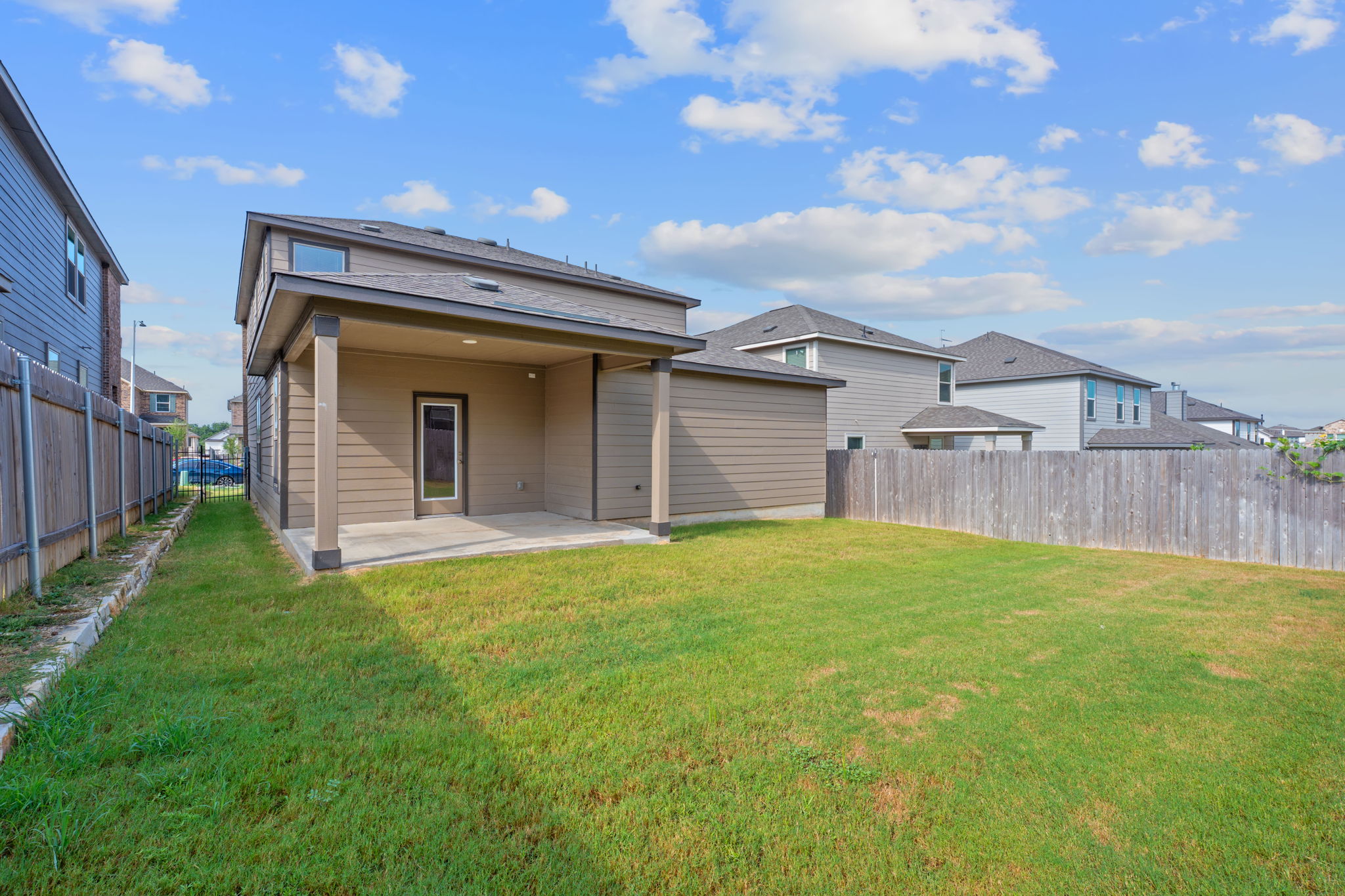 4720 Pell Rd Manor Manor, TX 78653 - Photo 29 of 31 a view of a backyard of the house