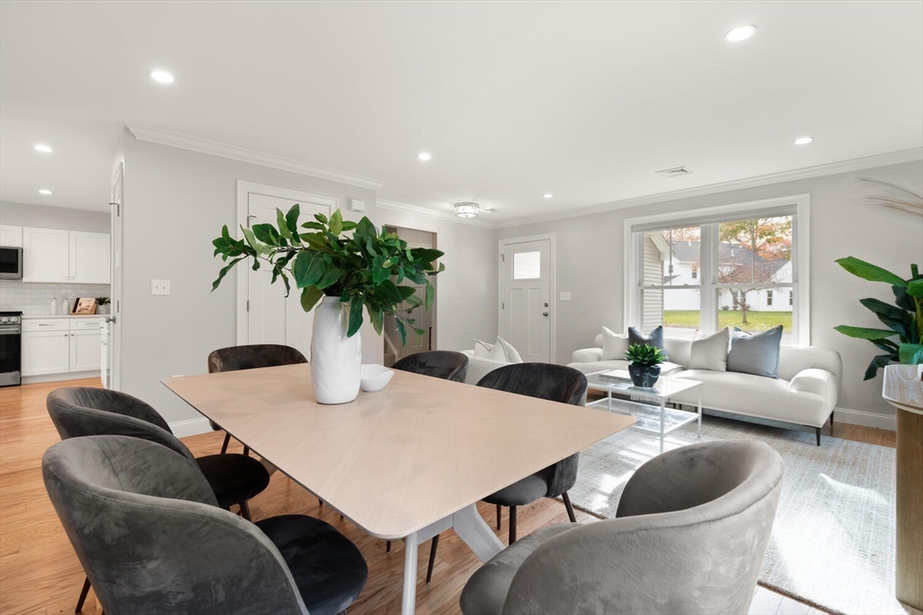 1 Barracks Road, Unit 1 Hudson, MA 01749 - Photo 14 of 29 a living room with furniture potted plant and a table