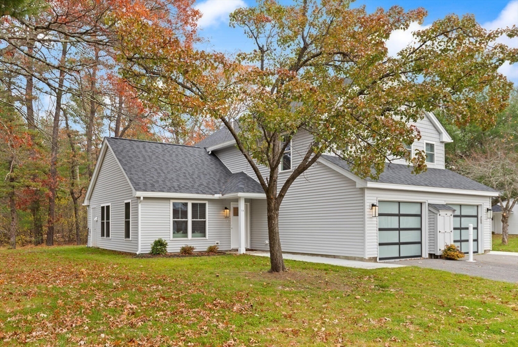 1 Barracks Road, Unit 1 Hudson, MA 01749 - Photo 22 of 29 a view of a house with a yard
