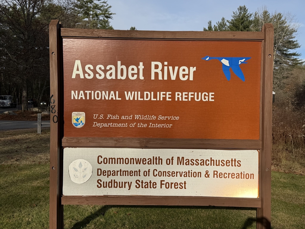 1 Barracks Road, Unit 1 Hudson, MA 01749 - Photo 29 of 29 a sign on the wall