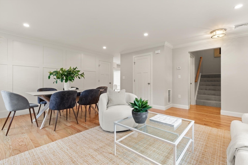 1 Barracks Road, Unit 1 Hudson, MA 01749 - Photo 6 of 29 a living room with furniture potted plant and a table
