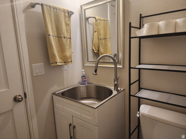 1283 North Gallen Road Santa Clara, UT 84765 - Photo 83 of 103 1/2 Bathroom with vanity and toilet in the detached garage area