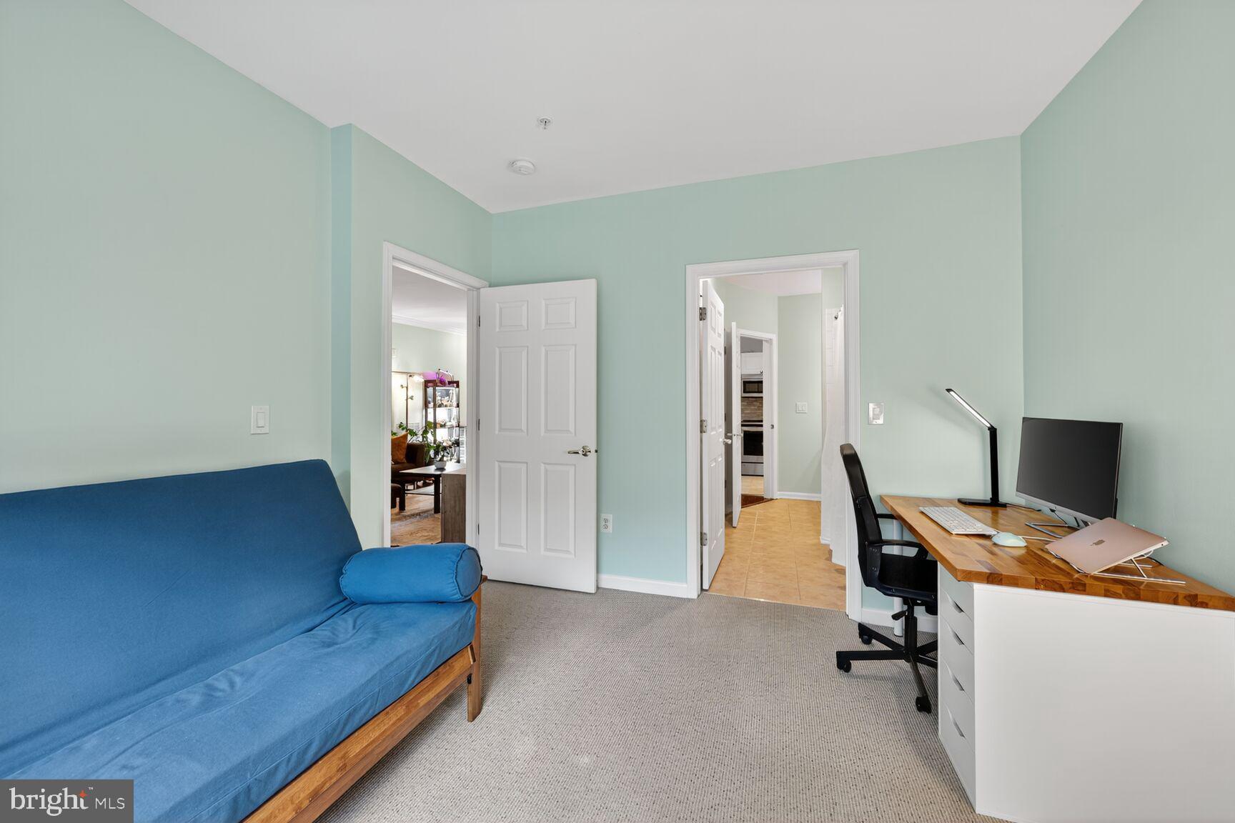 4561 Strutfield Lane, Unit 3211 Alexandria, VA 22311 - Photo 12 of 14 a living room with a couch and a couch