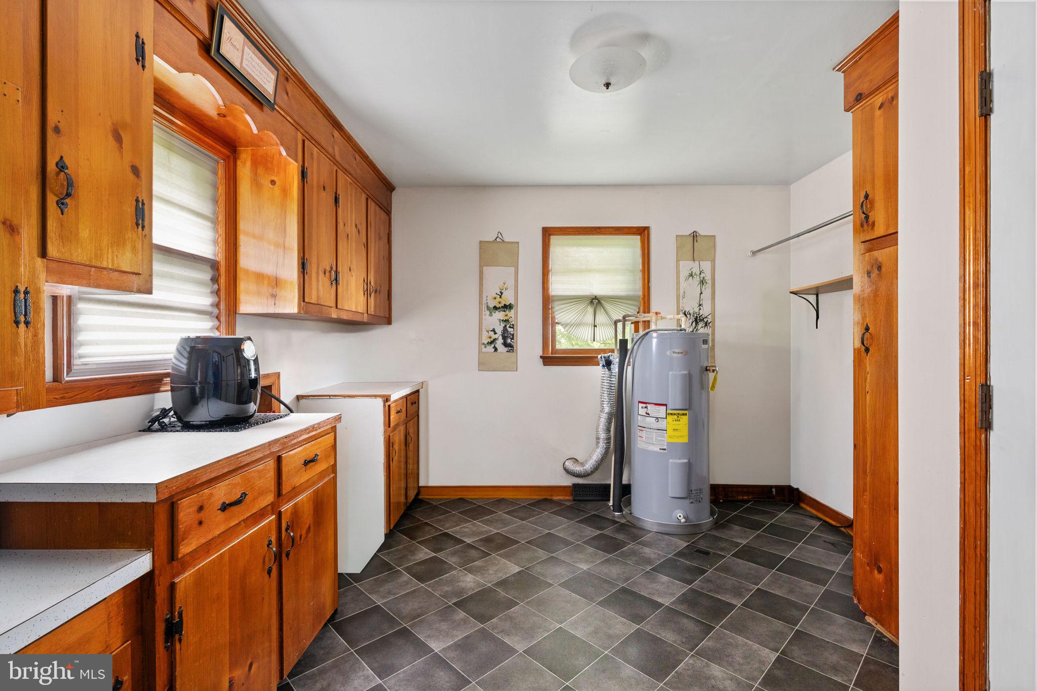 1440 Holly Farm Road Burkeville, VA 23922 - Photo 38 of 52 Bright and spacious laundry area.