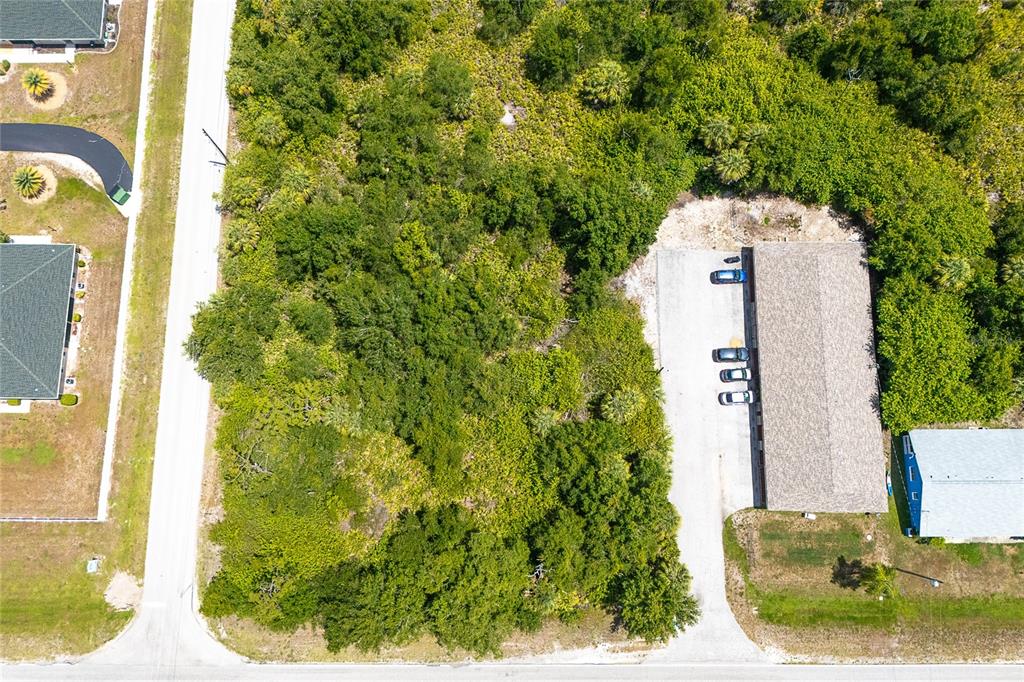 25018 Harbor View Road Punta Gorda, FL 33980 - Photo 11 of 12 a aerial view of a residential houses with yard