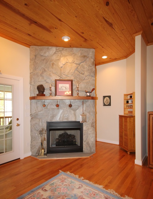 4031 Venable Road Kents Store, VA 23084 - Photo 13 of 47 a view of a livingroom with a fireplace