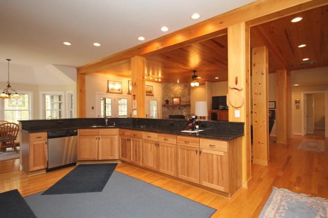 4031 Venable Road Kents Store, VA 23084 - Photo 18 of 47 a large kitchen with granite countertop a sink and cabinets