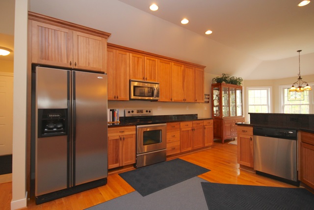 4031 Venable Road Kents Store, VA 23084 - Photo 19 of 47 a kitchen with stainless steel appliances a refrigerator and a stove top oven