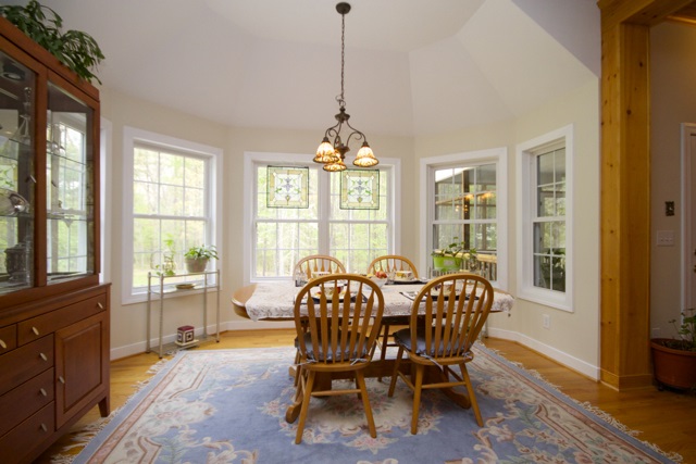 4031 Venable Road Kents Store, VA 23084 - Photo 20 of 47 a dining room with furniture a chandelier and wooden floor
