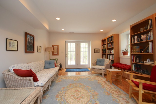 4031 Venable Road Kents Store, VA 23084 - Photo 32 of 47 a living room with furniture and a book shelf