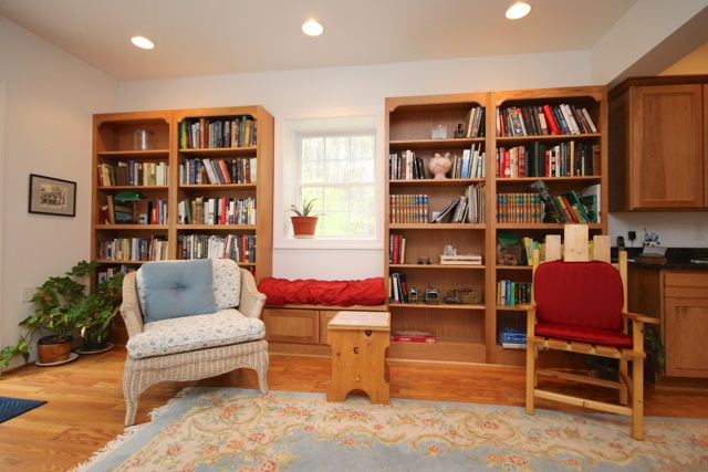 4031 Venable Road Kents Store, VA 23084 - Photo 33 of 47 a living room with furniture and a book shelf