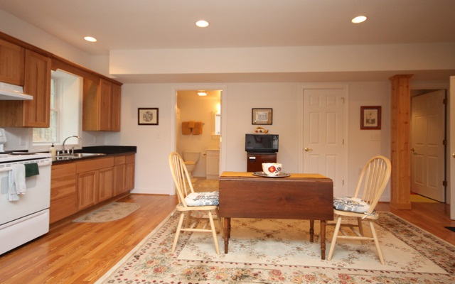 4031 Venable Road Kents Store, VA 23084 - Photo 35 of 47 a view of a dining room with furniture and wooden floor