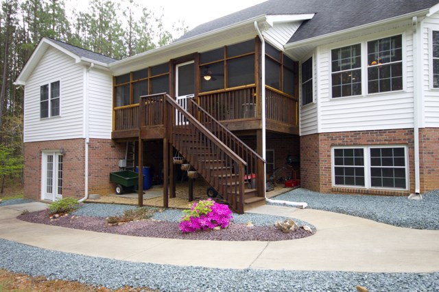 4031 Venable Road Kents Store, VA 23084 - Photo 44 of 47 a view of a house with wooden walls and entryway
