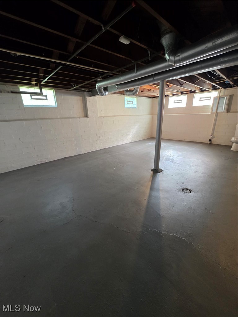 12813 North Road Cleveland, OH 44111 - Photo 20 of 30 Below grade area with healthy amount of natural light