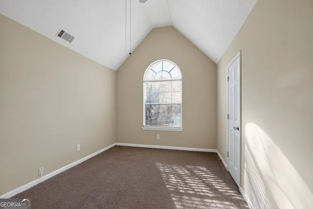 a view of a room with an empty space