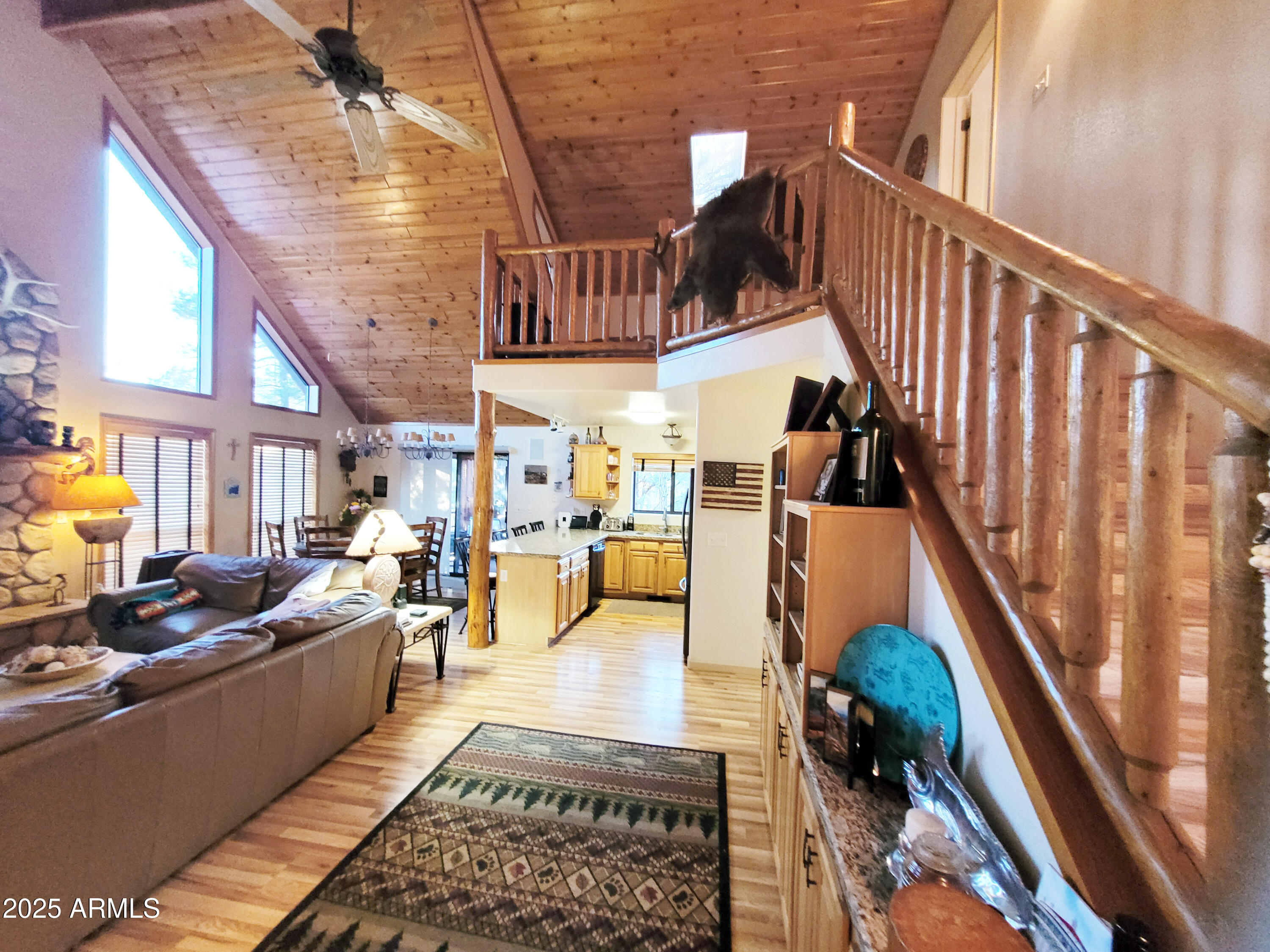 5579 Solitude Trail Loop Pine, AZ 85544 - Photo 19 of 50 a view of living room with furniture and a rug