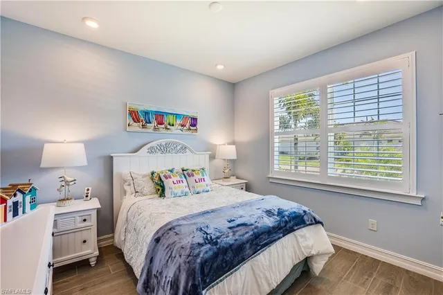 a bedroom with a bed and a cabinets