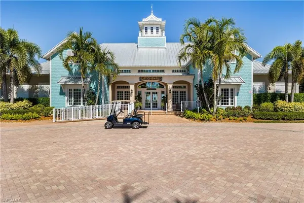 a view of a car park in front of house