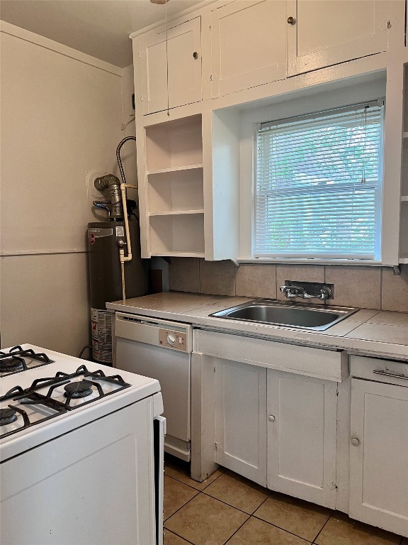 320 West Polk Street, Unit 2 Houston, TX 77019 - Photo 12 of 22 Compact and efficient kitchen with seamless access to the backyard. All appliances are included.