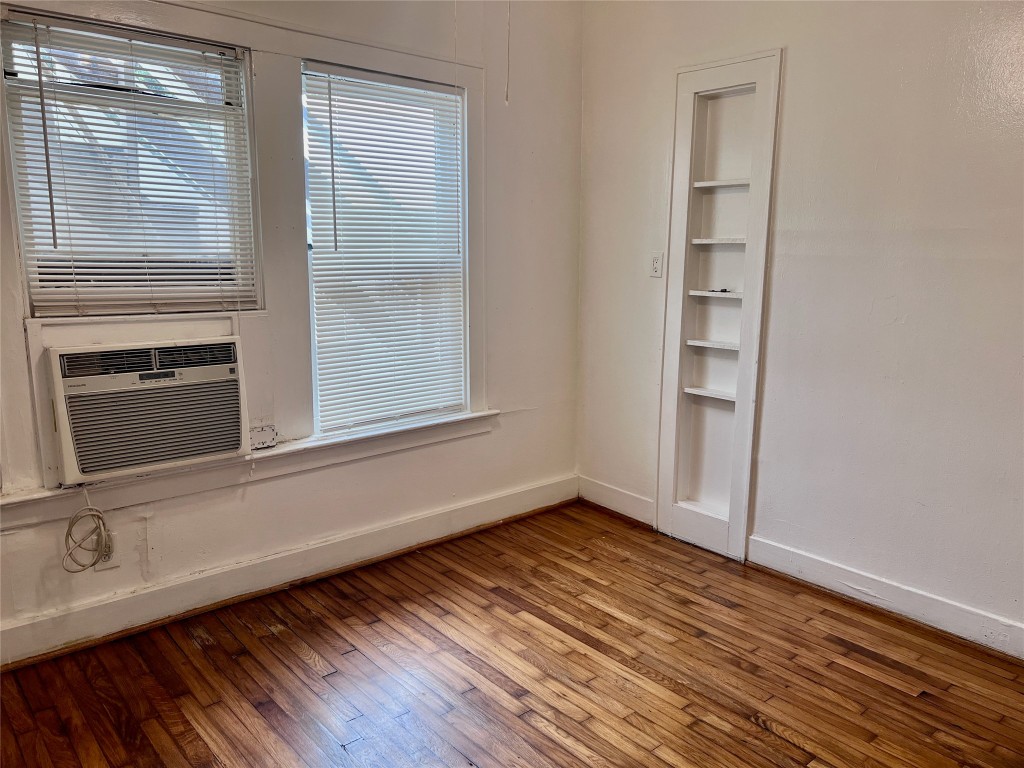 320 West Polk Street, Unit 2 Houston, TX 77019 - Photo 15 of 22 Bright dining room featuring hardwood floors.
