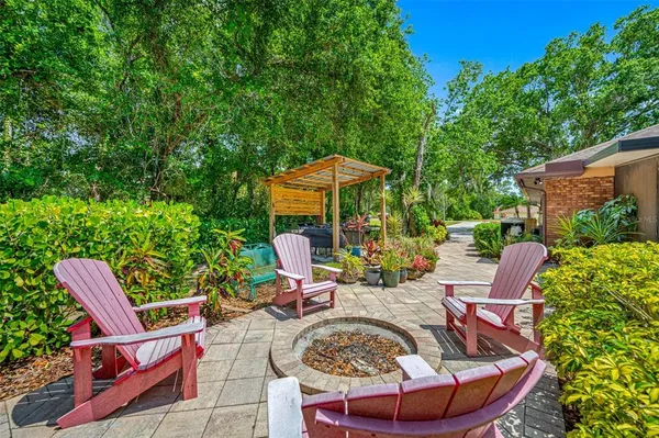 a view of swimming pool with a patio and yard