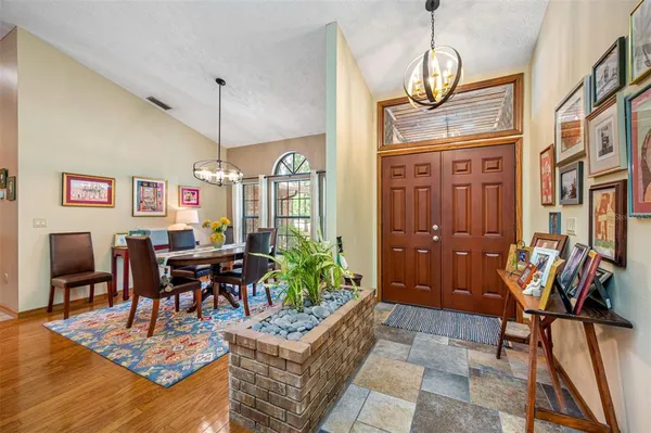 a large kitchen with lots of counter space and a sink