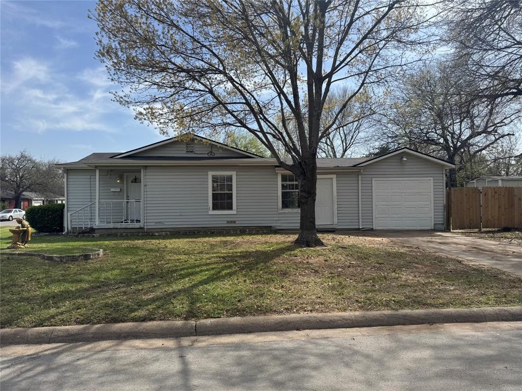 629 Harrison Lane Hurst, TX 76053 - Photo 18 of 20 a backyard of a house