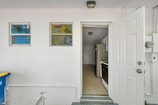 a view of livingroom with furniture and windows