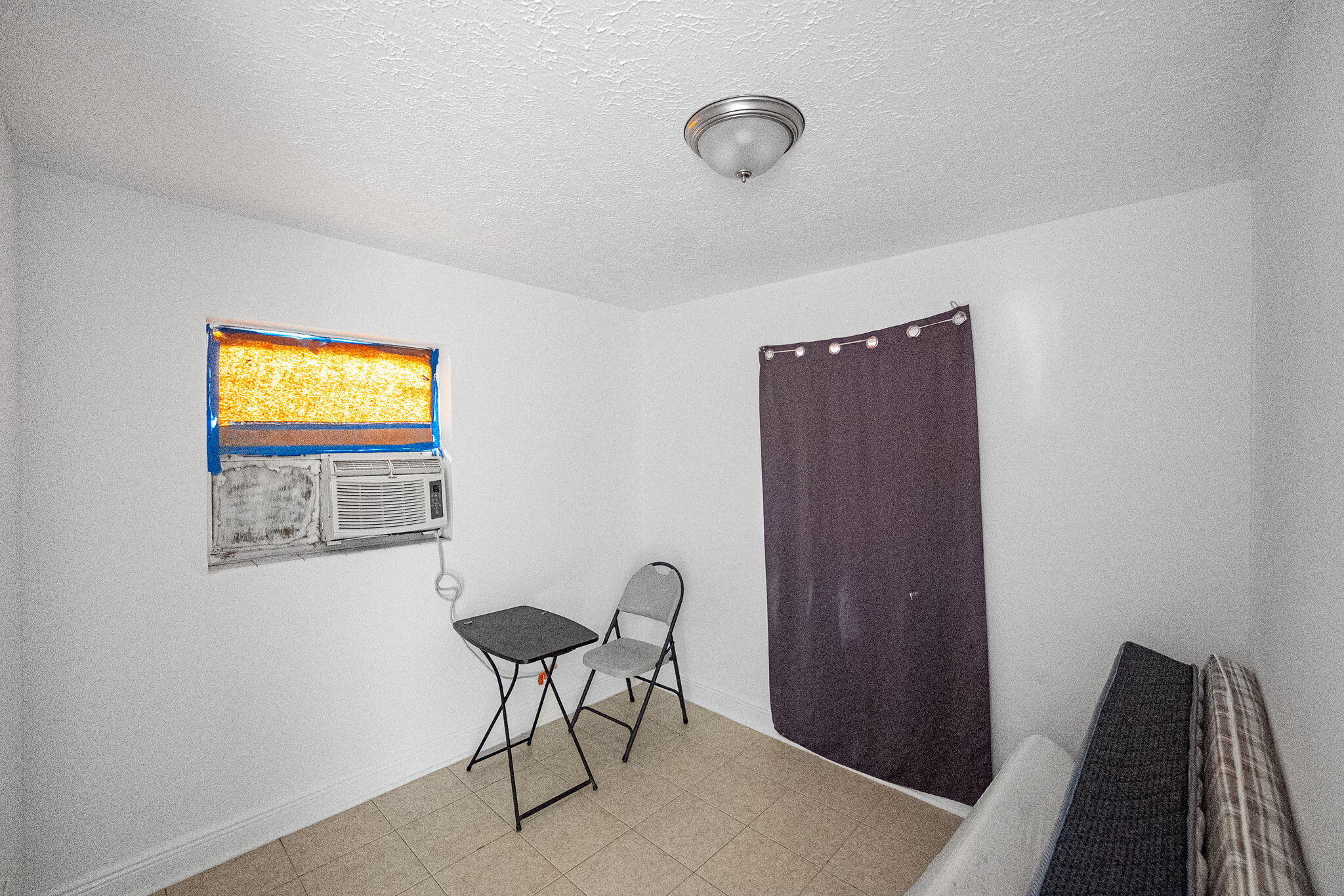 2108 Avenue East Fort Pierce, FL 34950 - Photo 27 of 32 a view of a livingroom with furniture and a window