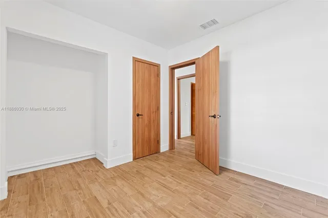 an aerial view of a house with swimming pool