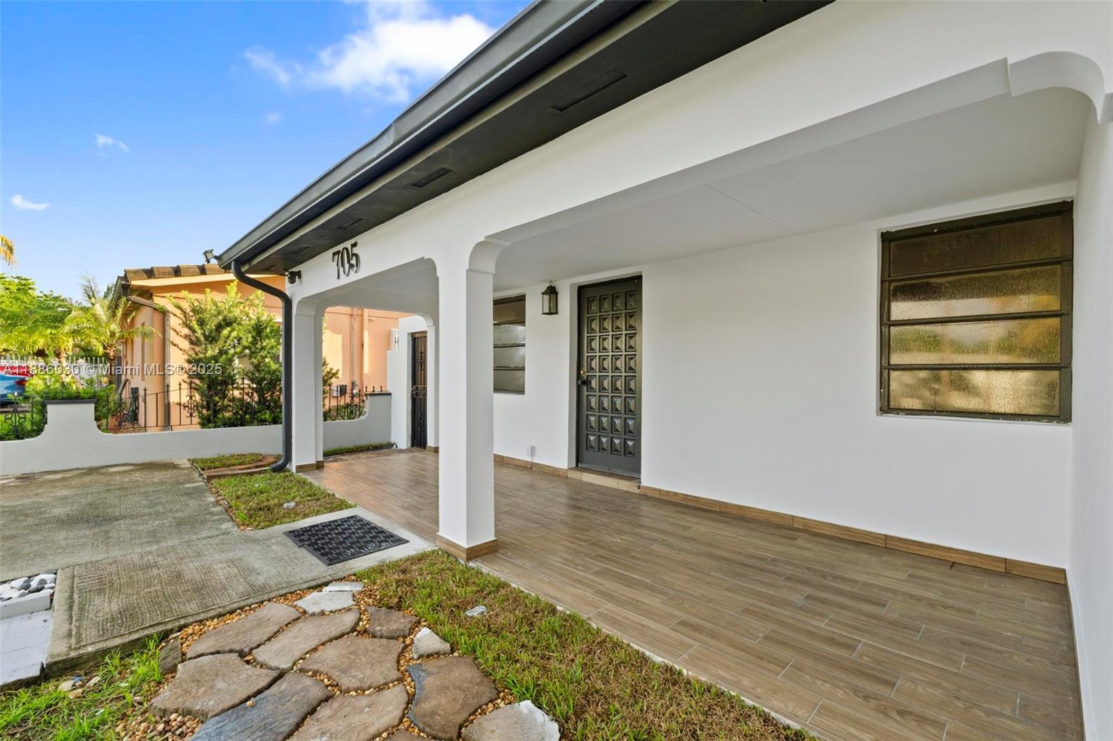 705 East 9th Lane Hialeah, FL 33010 - Photo 4 of 37 a view of an entryway of house