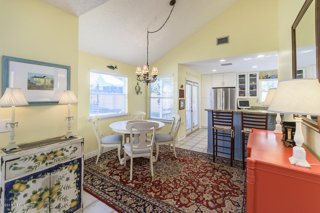 1767 Seminole Road Atlantic Beach, FL 32233 - Photo 12 of 36 a dining room with furniture and window