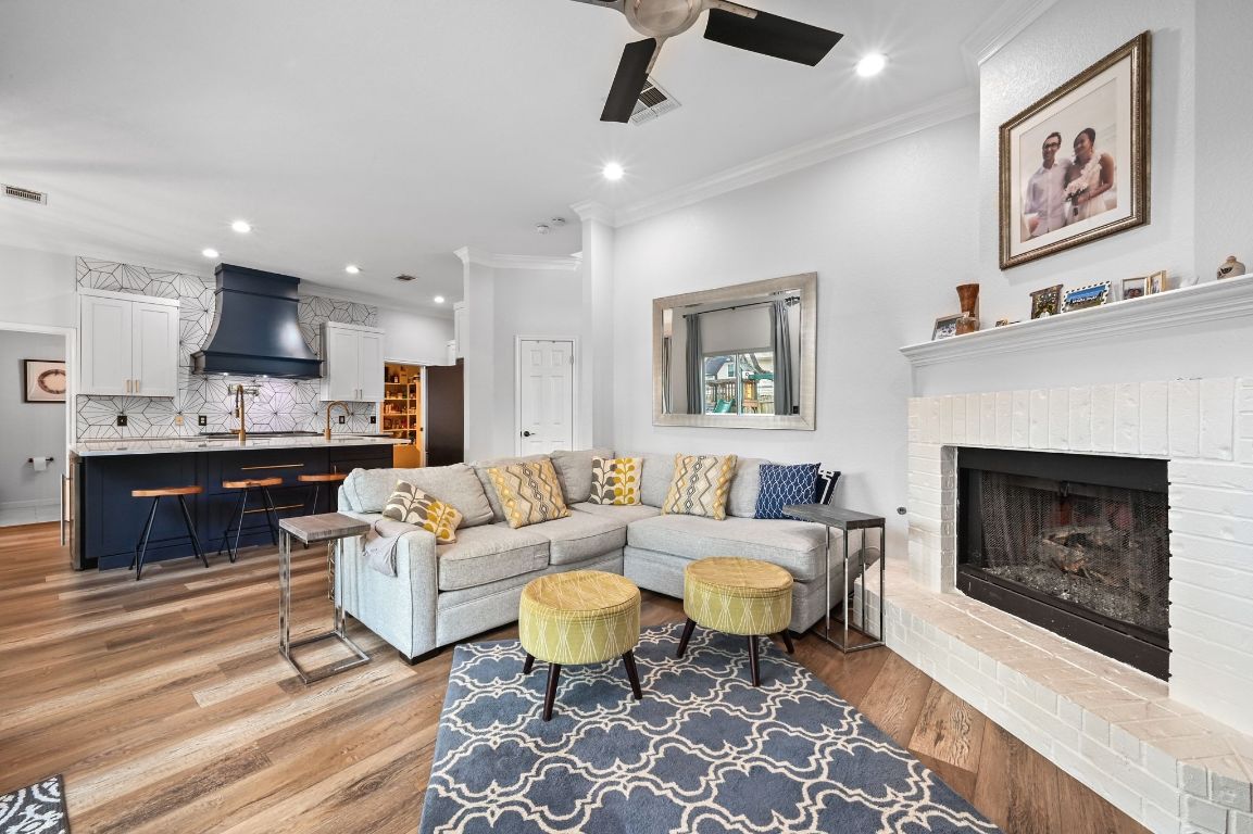 6609 Oasis Drive Austin, TX 78749 - Photo 11 of 27 a living room with furniture and a fireplace