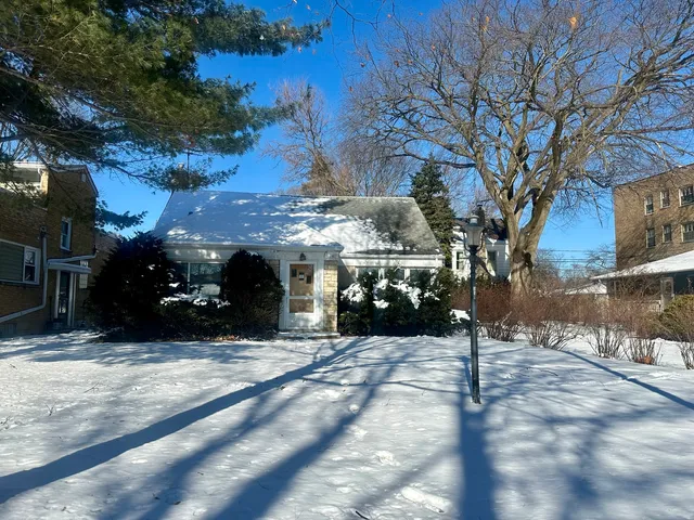 a view of a street with a building on the side