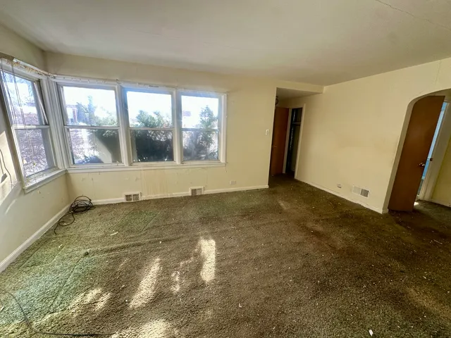 a room with furniture and window