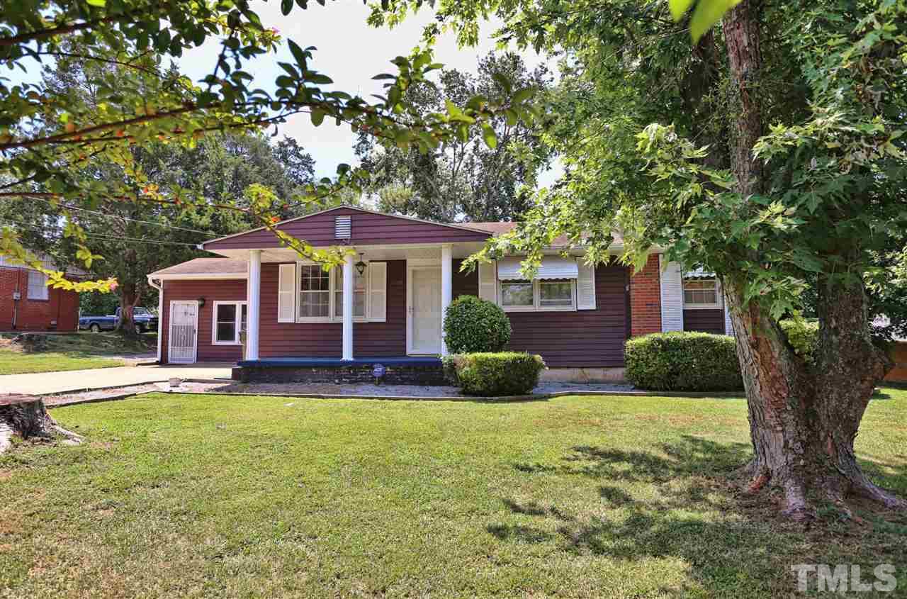 706 Fitzgerald Drive Raleigh, NC 27610 - Photo 3 of 10 a front view of a house with yard and green space