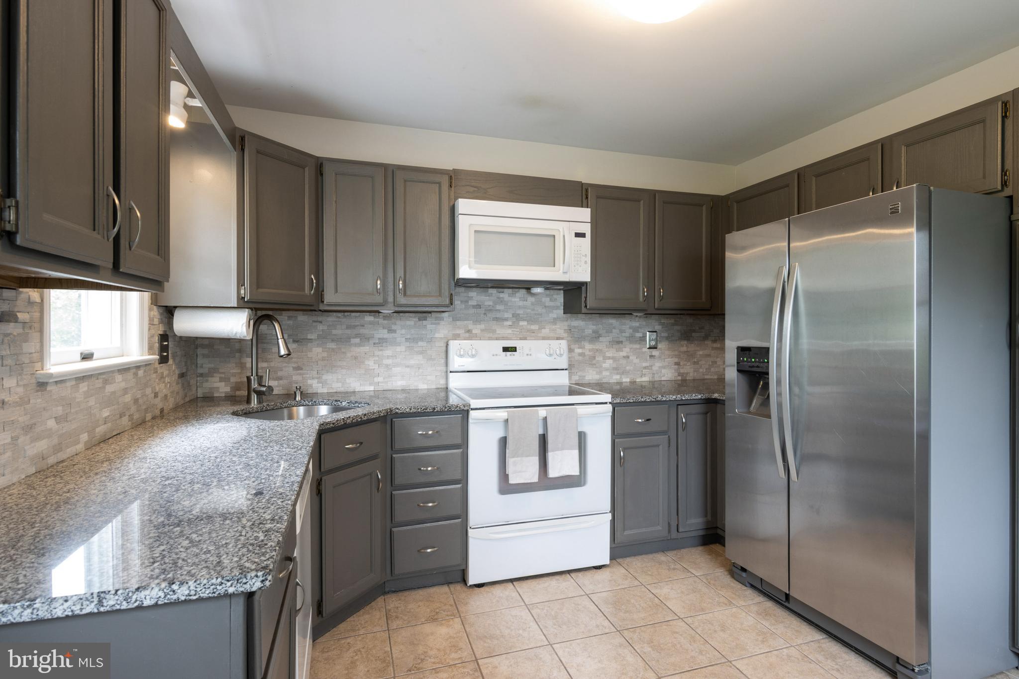44 Belfast Road Lutherville-Timonium, MD 21093 - Photo 12 of 34 Renovated kitchen w/ granite countertops
