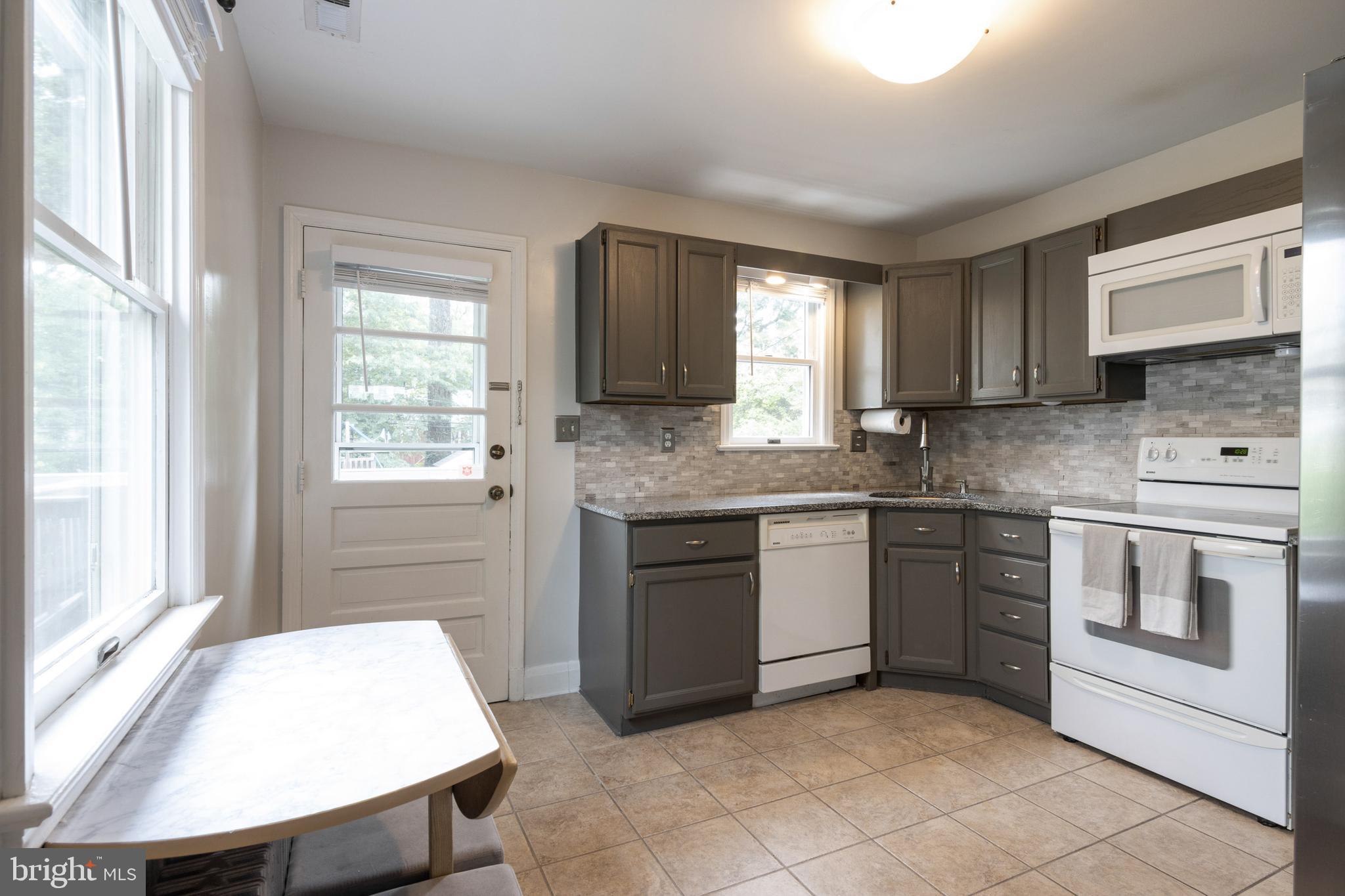 44 Belfast Road Lutherville-Timonium, MD 21093 - Photo 13 of 34 Rear exit off kitchen