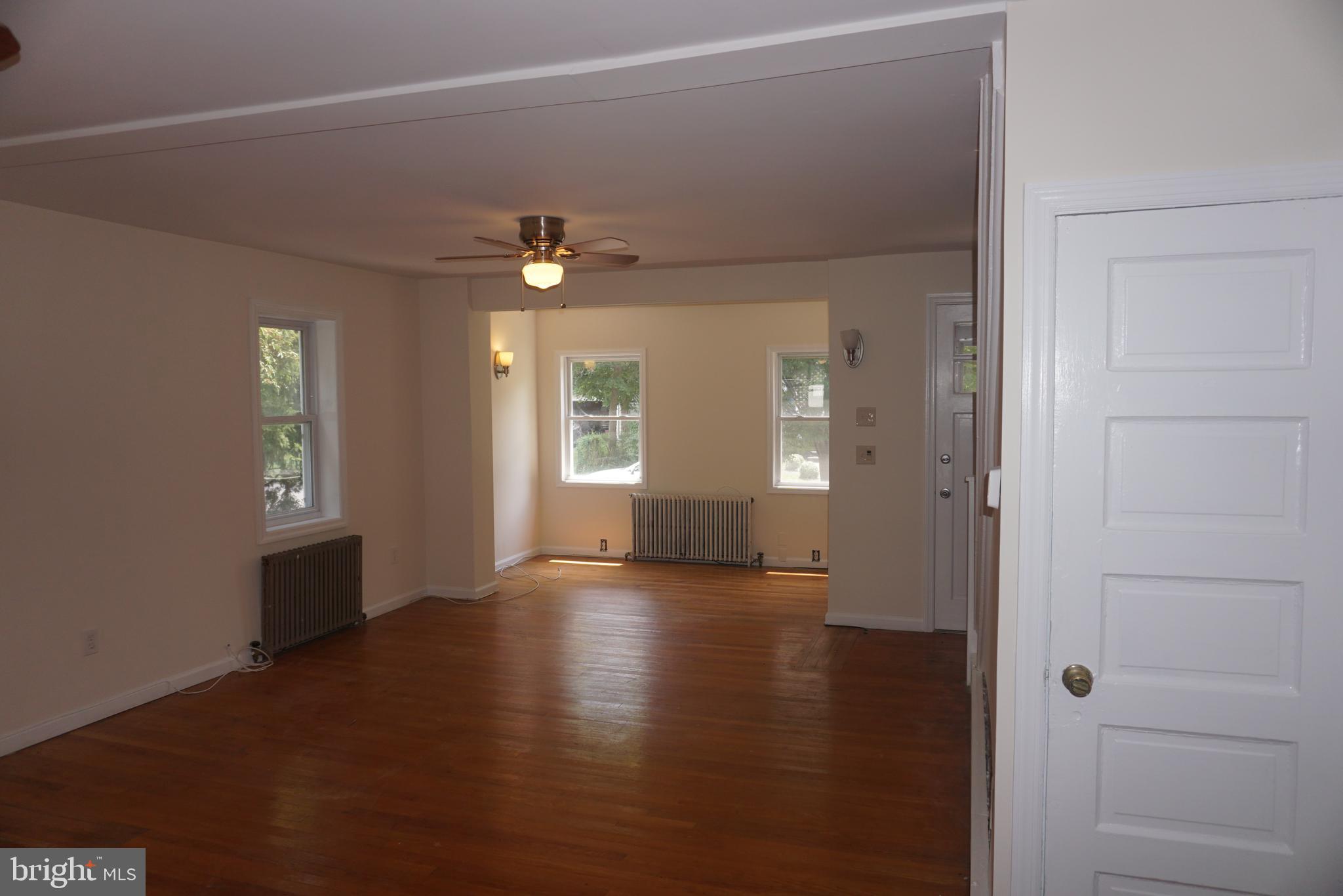 18 Oakland Street Princeton, NJ 08540 - Photo 7 of 9 wooden floor in an empty room with a window