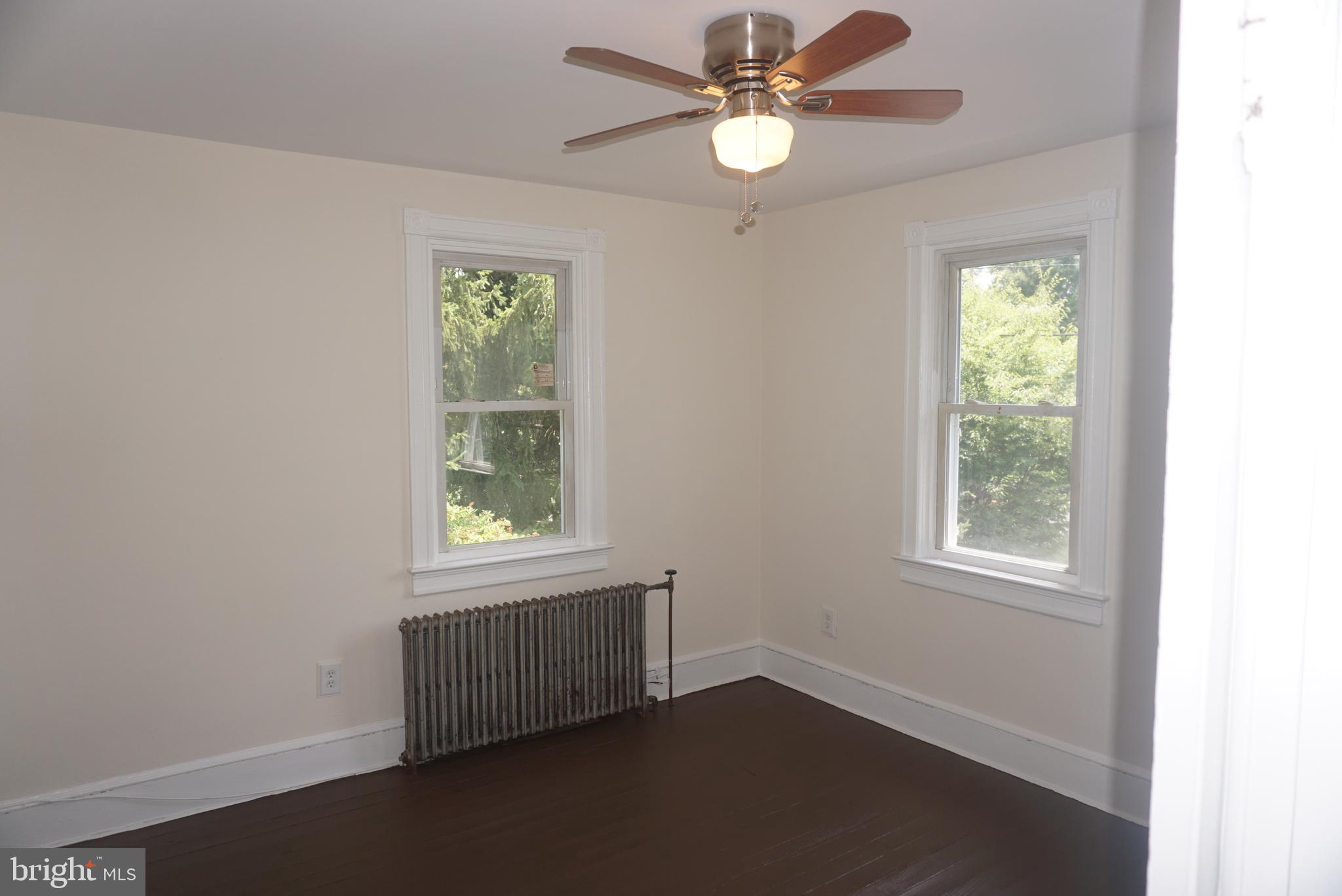 18 Oakland Street Princeton, NJ 08540 - Photo 8 of 9 an empty room with windows and fan