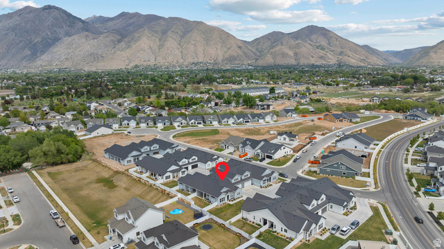 531 North Legend Way West, Unit D Mapleton, UT 84664 - Photo 38 of 42 View of property location featuring a mountain backdrop and nearby suburban area