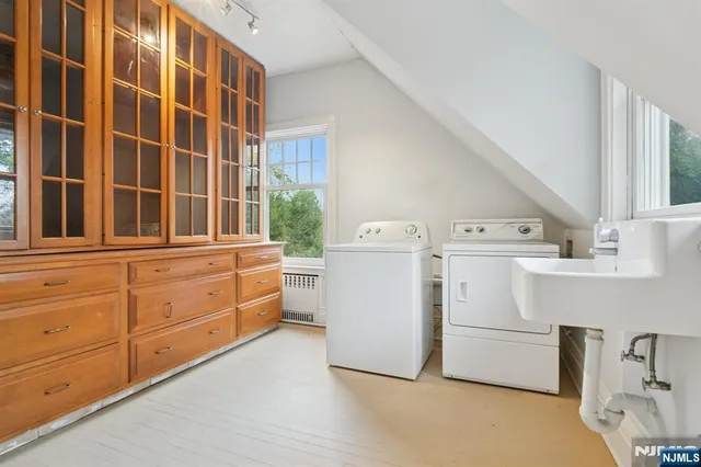 a utility room with dryer and washer