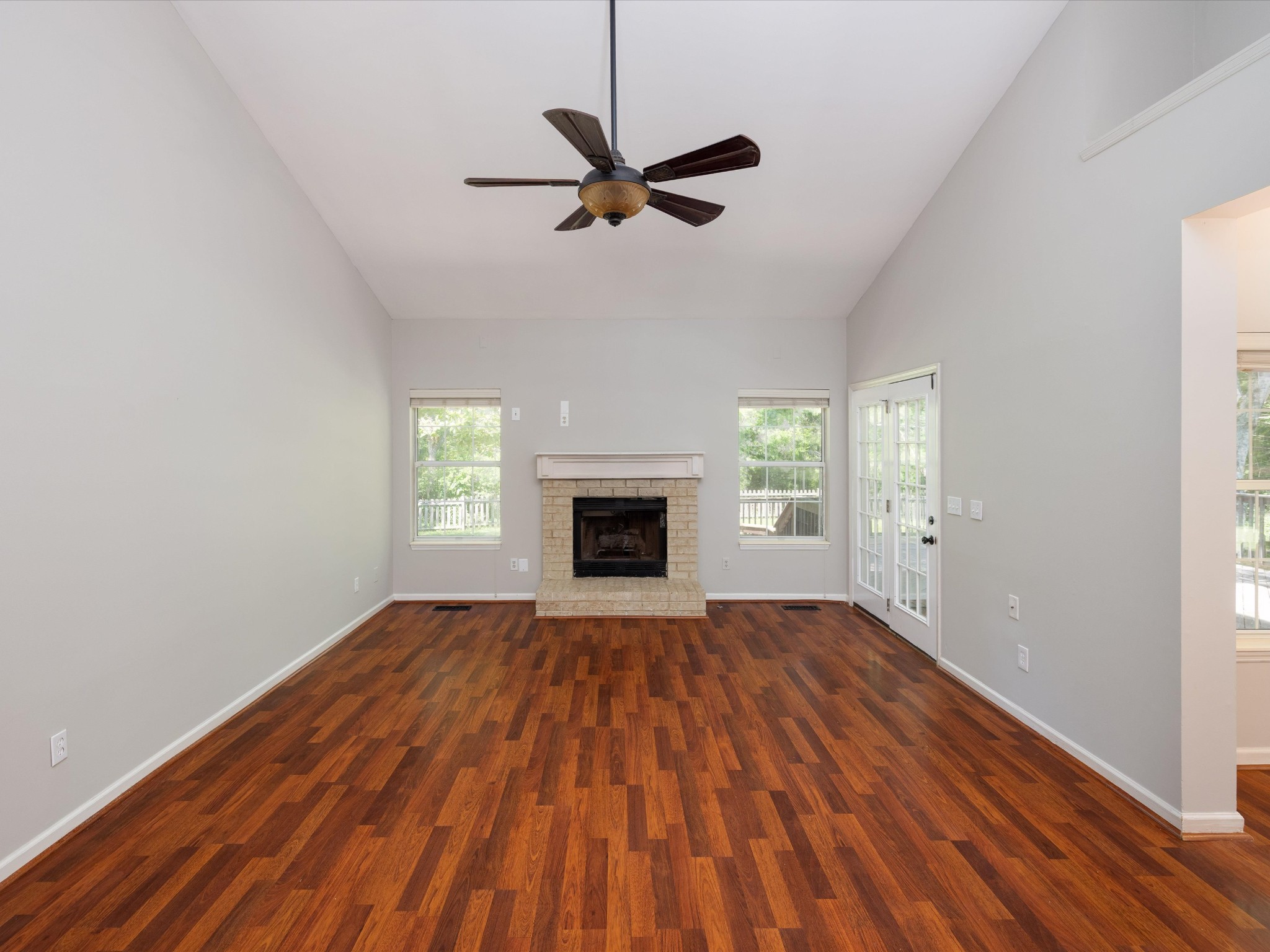 4629 Sandy Creek Road Nashville, TN 37221 - Photo 6 of 48 a view of empty room with wooden floor and fan