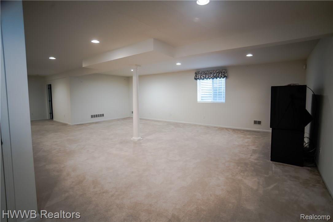 2122 Lagoon Drive Rochester, MI 48309 - Photo 20 of 31 Entertaining Area in Finished Basement