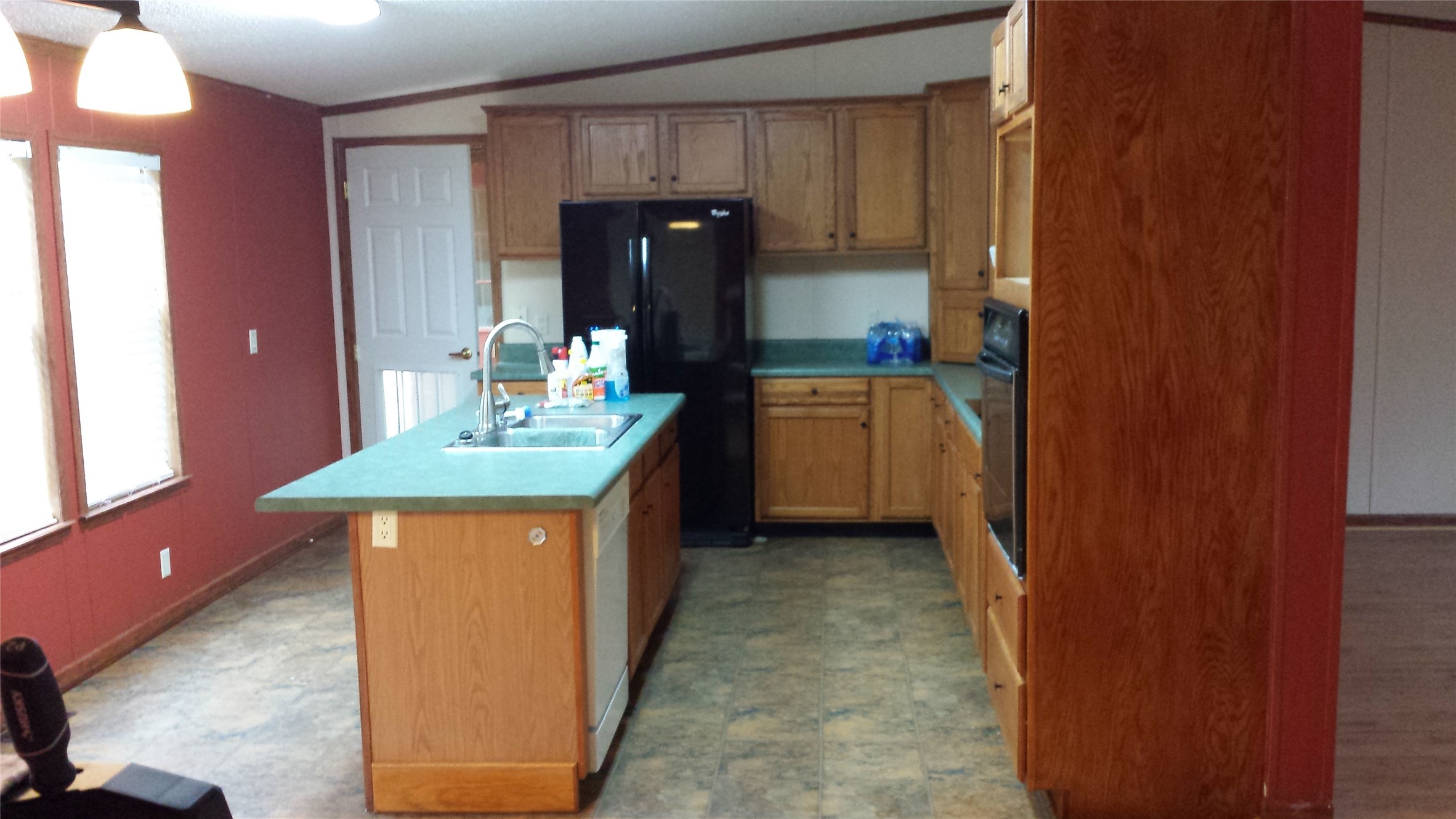 278 Country Way Road Smithville, TX 78957 - Photo 18 of 24 a kitchen with stainless steel appliances granite countertop wooden cabinets and sink