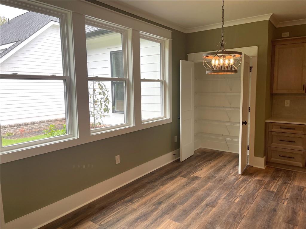 500 Mill Farm Lane Monroe, GA 30655 - Photo 13 of 35 a view of an empty room with a window