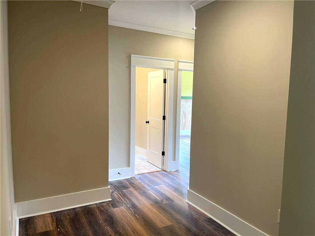 500 Mill Farm Lane Monroe, GA 30655 - Photo 19 of 35 a view of a hallway with wooden floor
